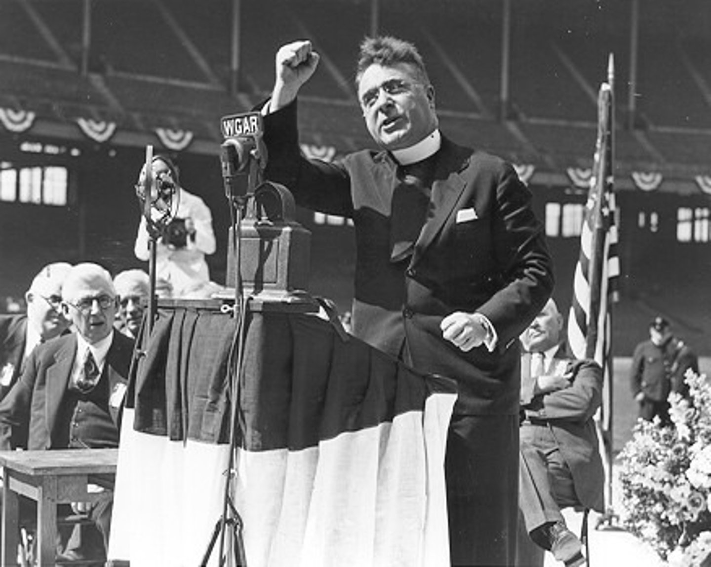 <p>Catholic priest from Michigan who was critical of FDR on his radio show. His radio show morphed into Anti-Semitic rants during WWII and he was eventually kicked off the air; he was popular among those who opposed FDR's New Deal.</p>