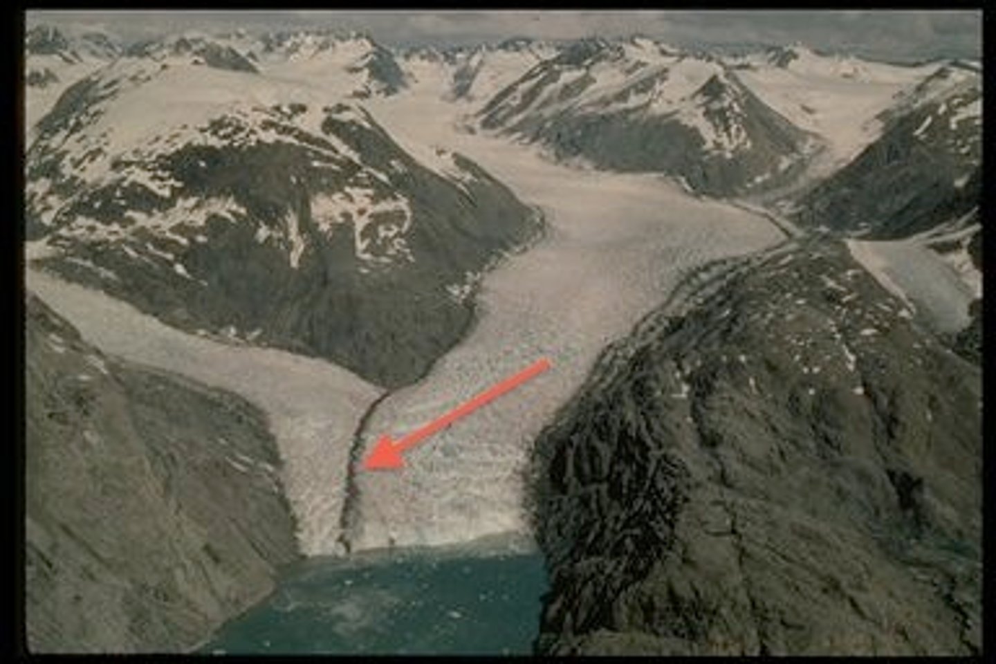 <p>A moraine formed when two advancing valley glaciers come together to form a single ice stream, forms in the middle of the glacier</p>