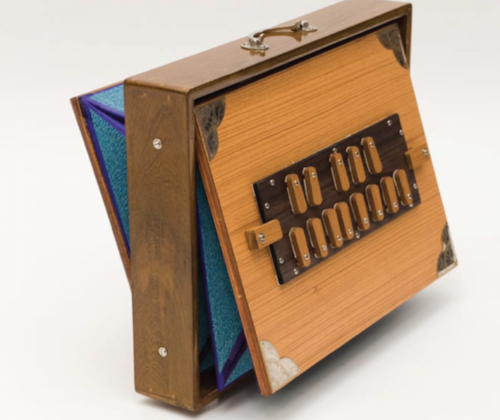 <p>A small drone-producing instrument, traditionally using bellows but now often electronic.</p>
