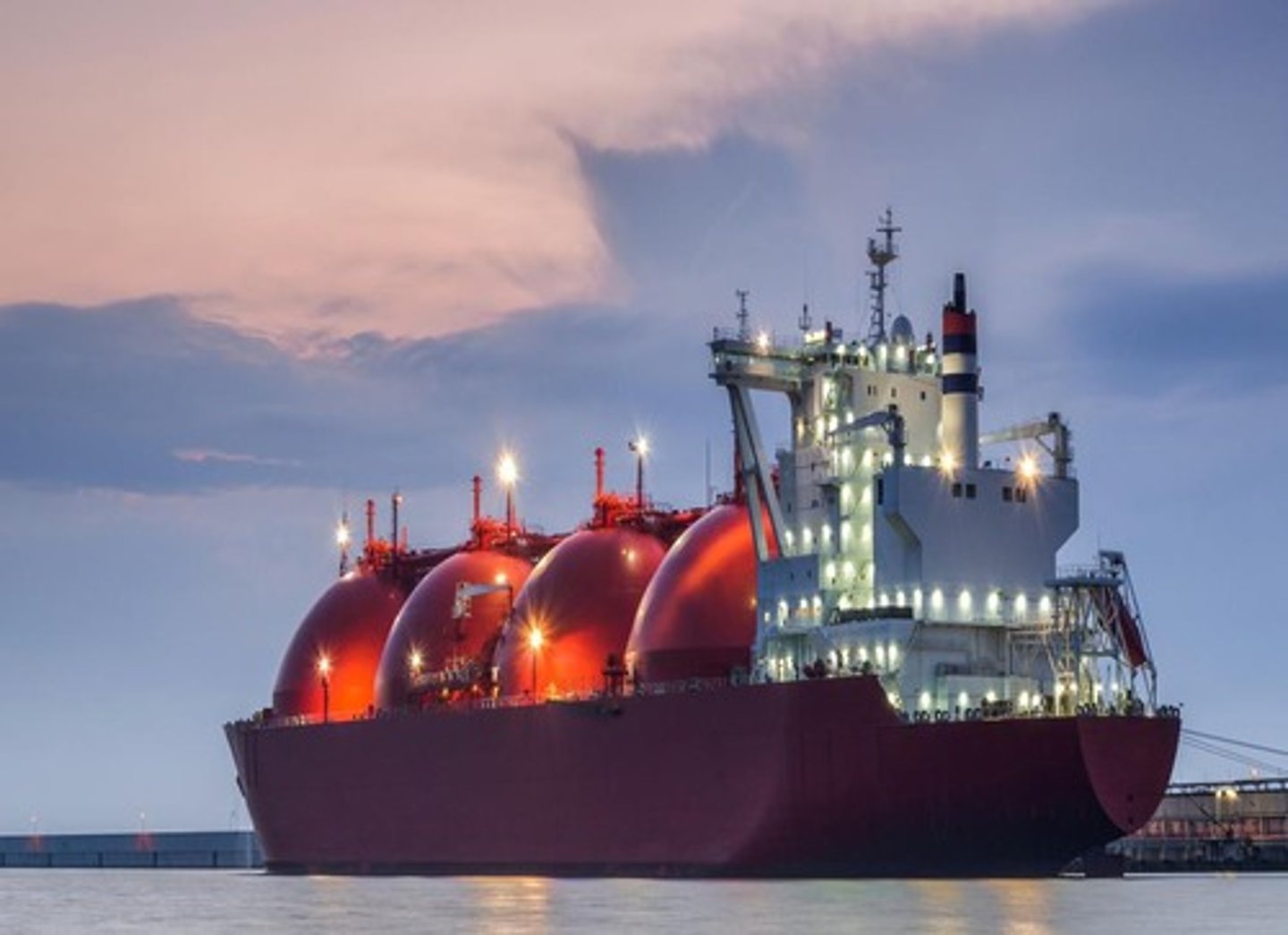 <p>LNG is natural gas cooled to -162°C, reducing its volume by ~600 times, enabling intercontinental trade independent of pipelines.</p>