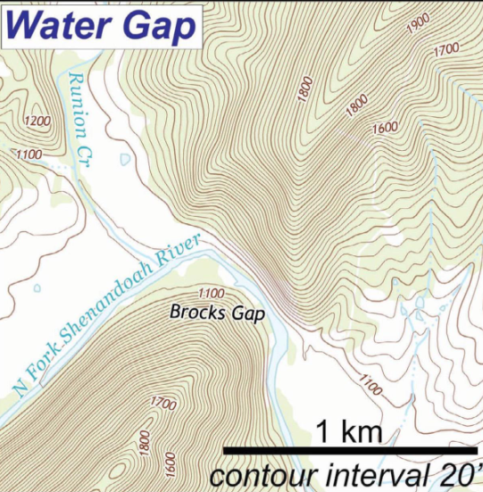 <p>Gap through a ridge with stream cutting the topography of the ridge</p>