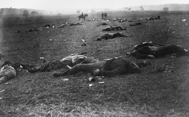 <p><strong>Artist’s Goal</strong> </p><ul><li><p>Document the true cost of the American Civil War without romanticization</p></li><li><p>Provide visual evidence of battlefield death for public understanding</p></li><li><p>Support the idea that photography could truthfully record history</p></li></ul><p> <strong>What It Says About Artist / Society / History</strong> </p><ul><li><p>Reflects O’Sullivan’s belief in showing <strong>reality over heroism</strong></p></li><li><p>Indicates the public’s growing desire for <strong>factual, unfiltered war images</strong></p></li><li><p>Demonstrates a shift from glorified battle paintings to <strong>brutal documentation</strong></p></li><li><p>Shows a nation grappling with mass death and industrialized warfare</p></li></ul><p> <strong>How the Message Is Communicated</strong> </p><ul><li><p>Unposed bodies in the foreground convey <strong>devastation and anonymity</strong></p></li><li><p>Repetition of corpses creates a sense of <strong>scale and inevitability</strong></p></li><li><p>Bleak, barren landscape emphasizes the <strong>emptiness and futility</strong> of war</p></li><li><p></p></li></ul><p></p>