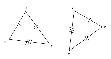 <p>a small line drawn on the sides of identical triangles</p>