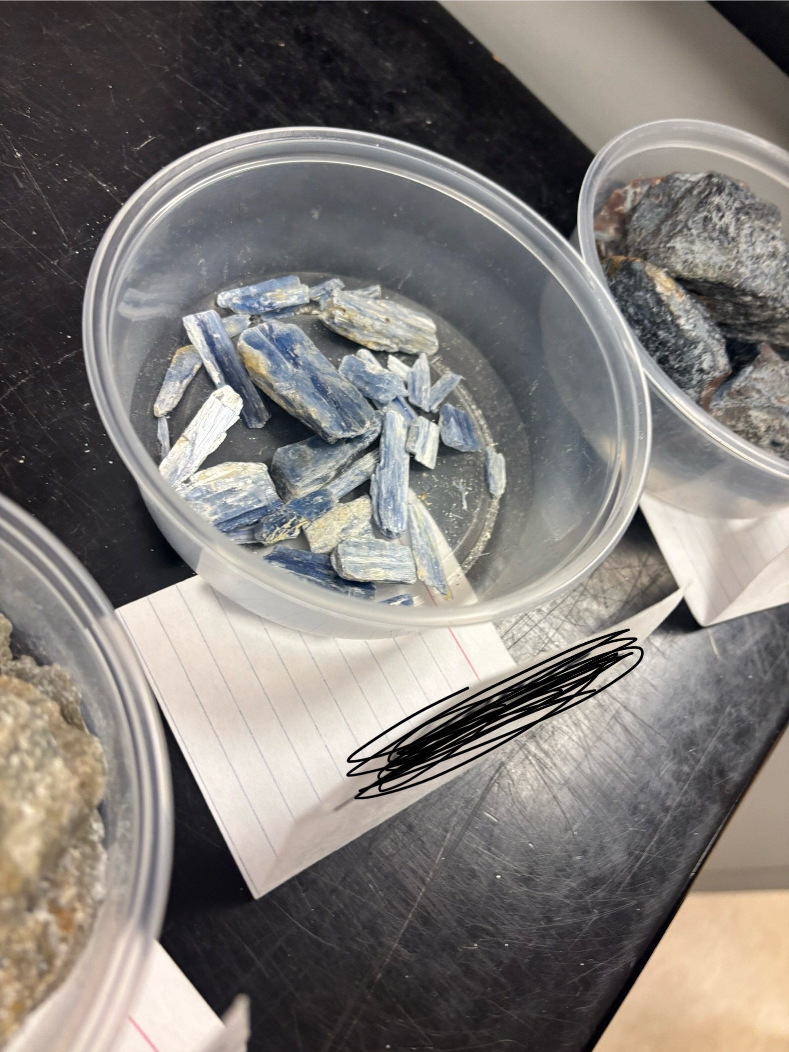 <p>Blue bladed mineral; forms under high pressure, low temperature; polymorph with sillimanite and andalusite.</p>