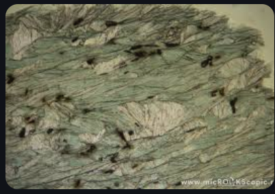 <p>Green/blue to pale, Basal cleavage - 1 plane, low to moderate relief, Pleochroism, 1st order birefringence, parallel extinction, metamorphic</p>