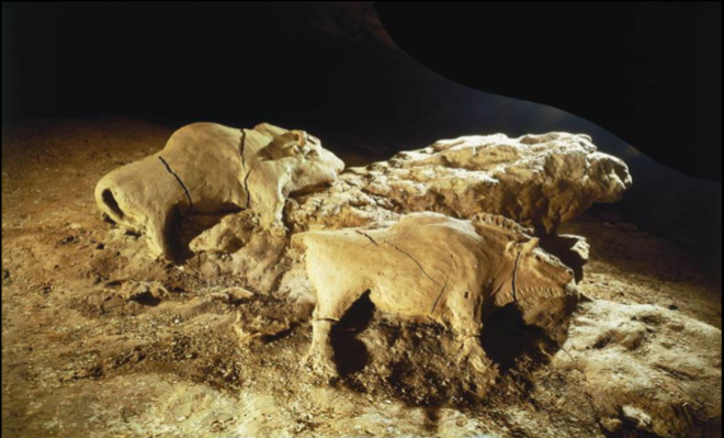 <p>What type of sculpture would this be?</p><p>Two Bison. Tuc d'Audoubert Cave, Ariège, France. clay</p>
