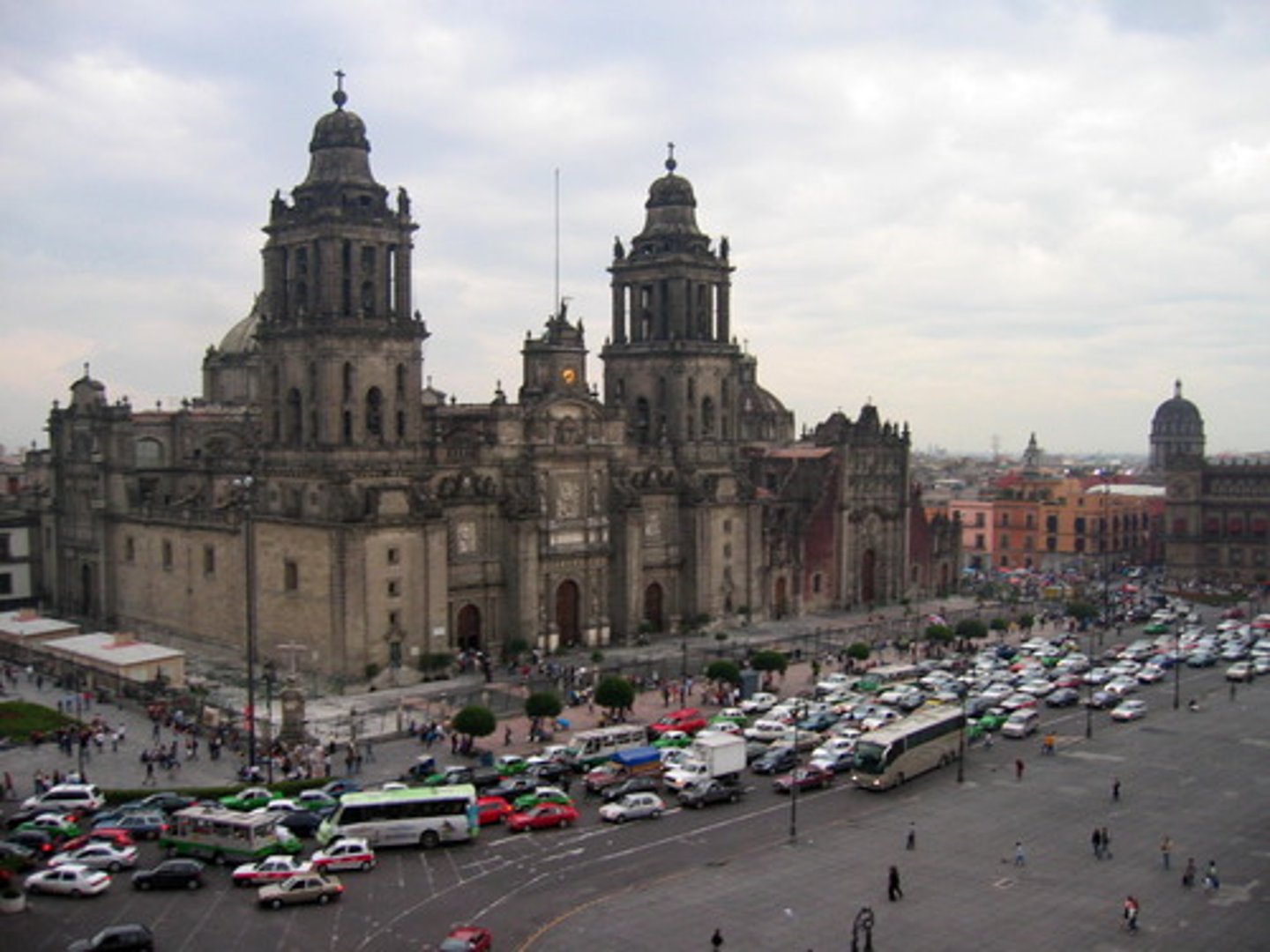 <p>Spanish colonialism influenced architecture of the cultural landscape.</p><p>Why? The Spanish settlement of Mexico caused Catholicism to diffuse in Mexico. Catholic churches such as the one shown in the image were constructed in Mexico City and throughout Latin America, altering the spatial patterns of the cultural landscape.</p>