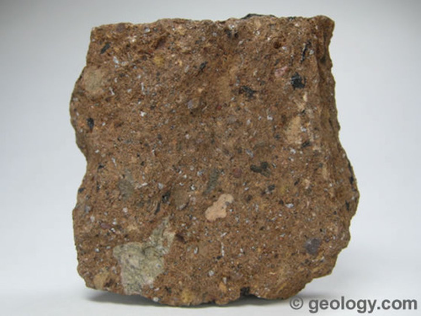 <p>-Rock is made of fragments of volcanic glass, mineral crystals, or lithic (rock) fragments. Much of the rock is ash. <br>-EXTRUSIVE texture</p>