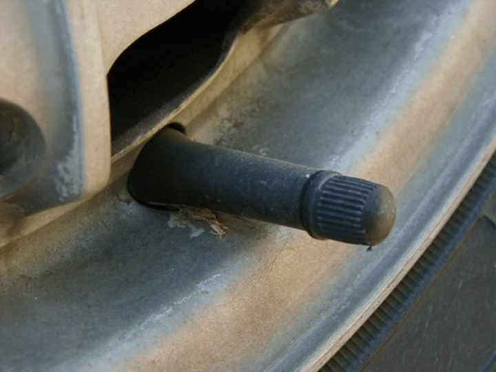 <p>A small, usually protruding, part of the inner tube that allows for air inflation</p>