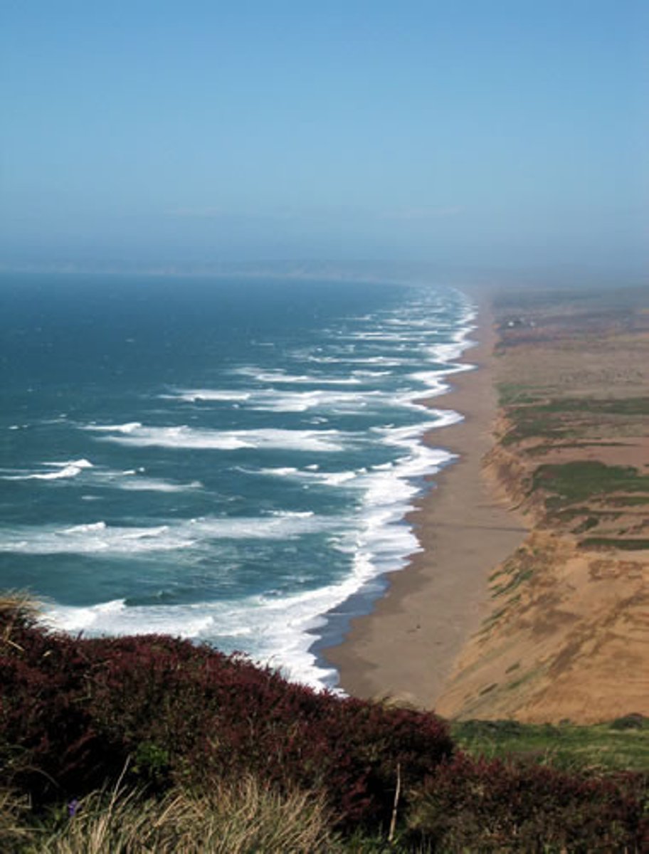 <p>on the shore of</p>