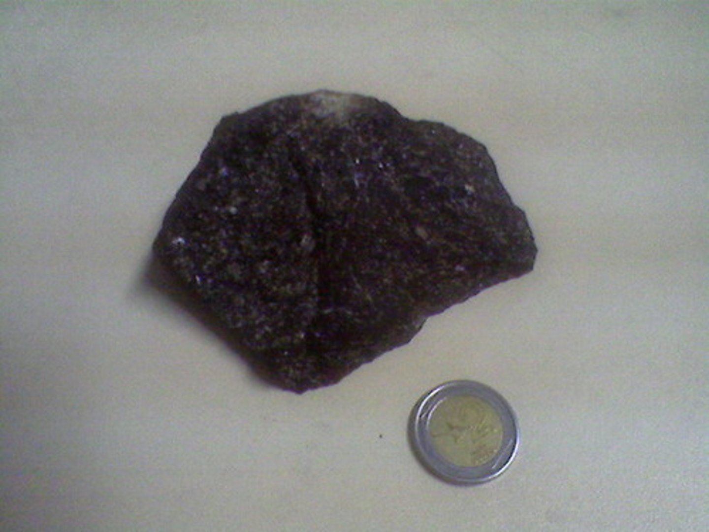 <p>Coarse-grained, dark-colored. Usually black or dark green in color and composed mainly of the minerals plagioclase and augite. Most abundant rock in the deep oceanic crust.</p>