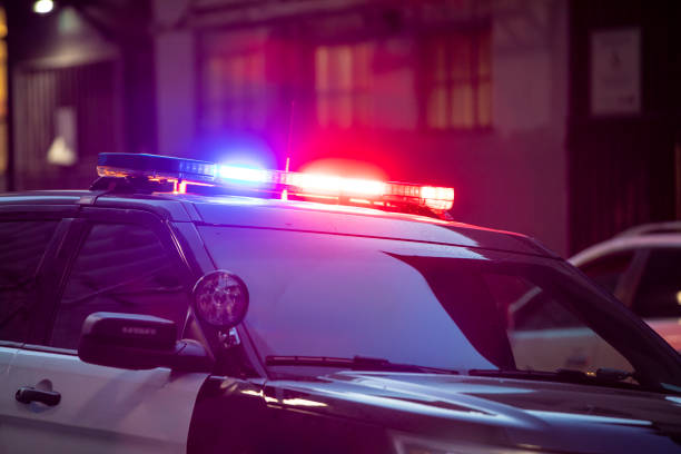 <p><strong>You drive along a street and hear a siren. You cannot immediately see the emergency vehicle. What should you do?</strong></p>
