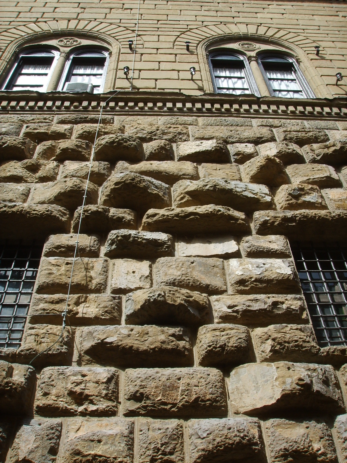 <p><span style="line-height: 115%;"><span>made of stone that are typically rough and raised off of the all surface</span></span></p>
