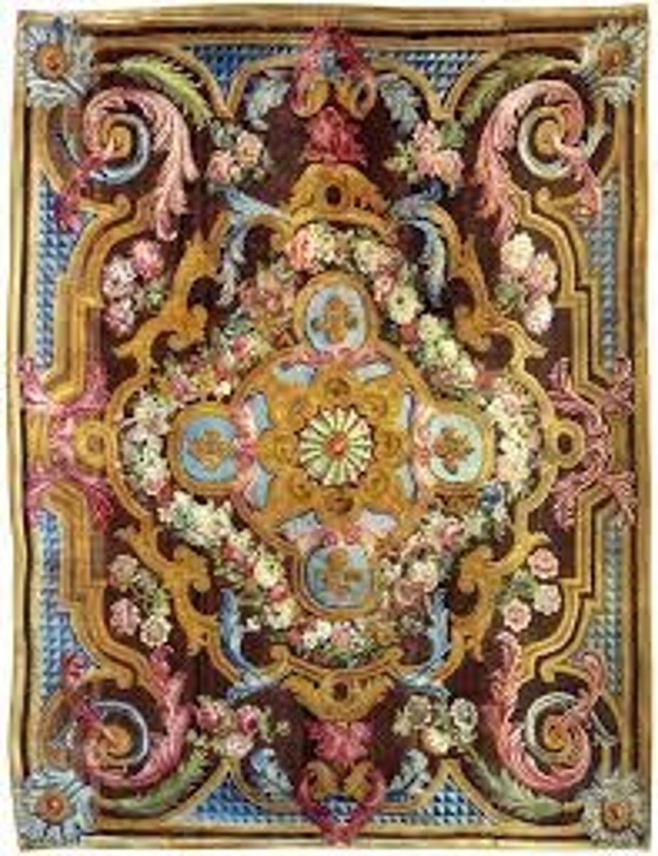 <p>Hand-woven rug with a high pile, in pastel colors and floral and scroll patterns. Produced in the rug and tapestry factory at the former soap works outside Paris.</p>