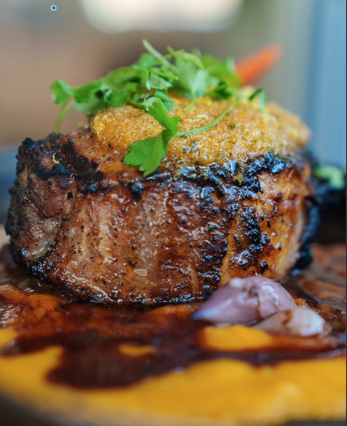 <p>Grilled Tomhawk Porkchop</p>