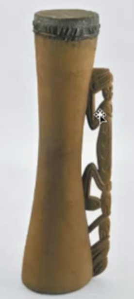 <p>What does the preying mantis represent on the drum?</p>