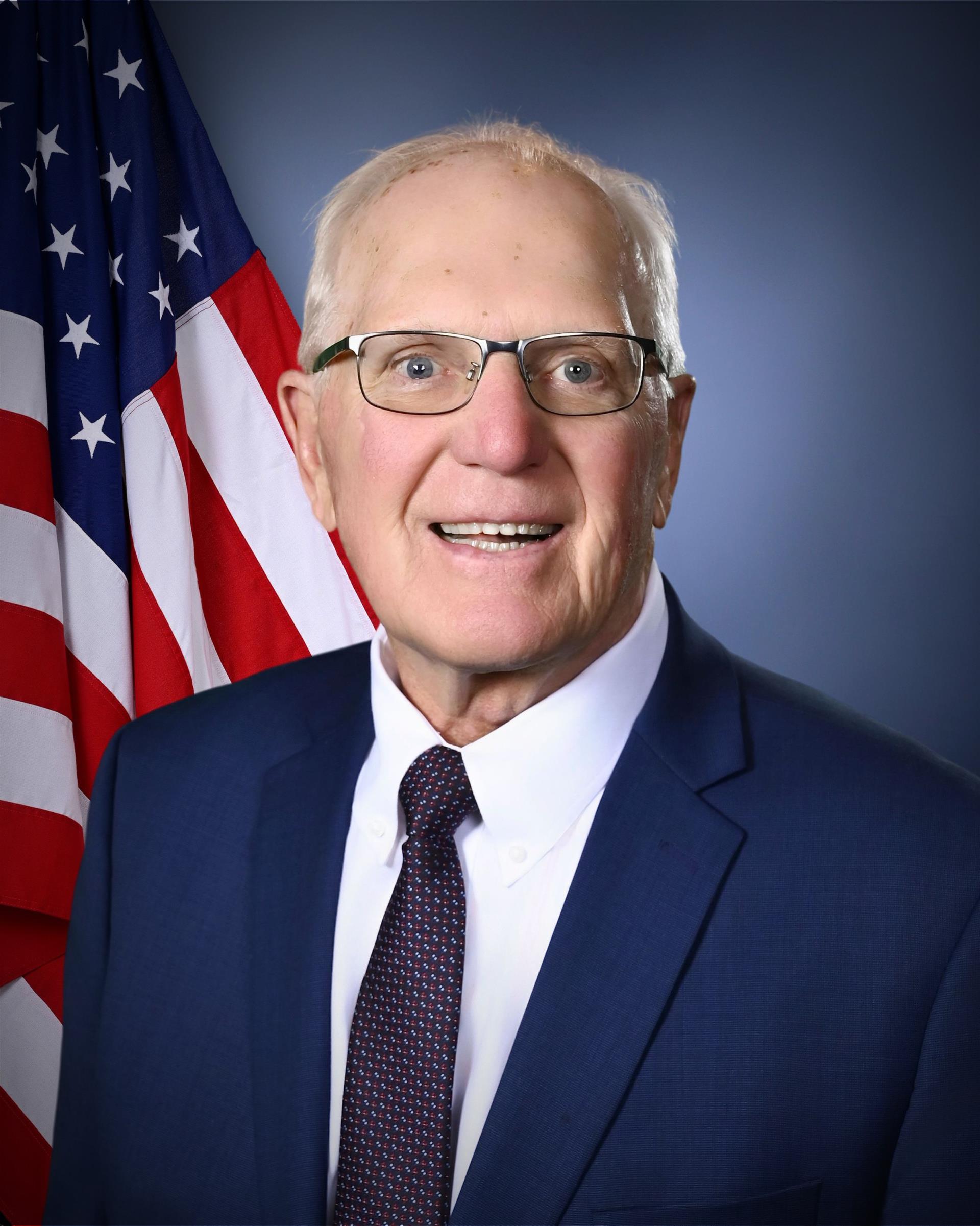 <p><span>Elected in In April 2015. Partner with Mudron Kane Insurance Agency. Insurance broker in the Joliet area for over 50 years. Previously, resident of the Joliet Park District Foundation, Chairman of the Work Force Investment Board of Will County, president of the Will County Old Timers Baseball Association, Joliet Catholic Athletic Booster and Alumni Association and St Raymond’s athletic board, school board and parish council.</span></p>