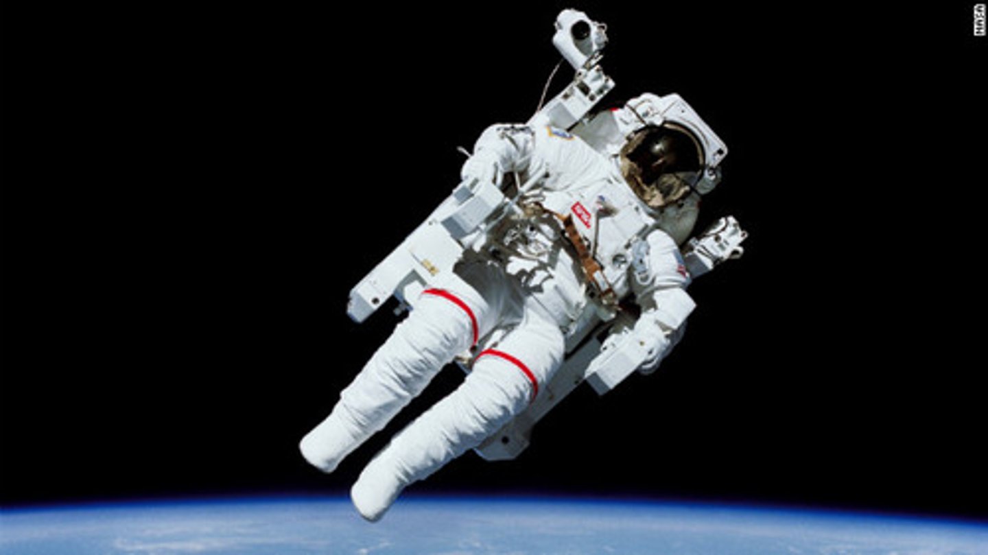 <p>the condition of experiencing weightlessness in orbit</p>