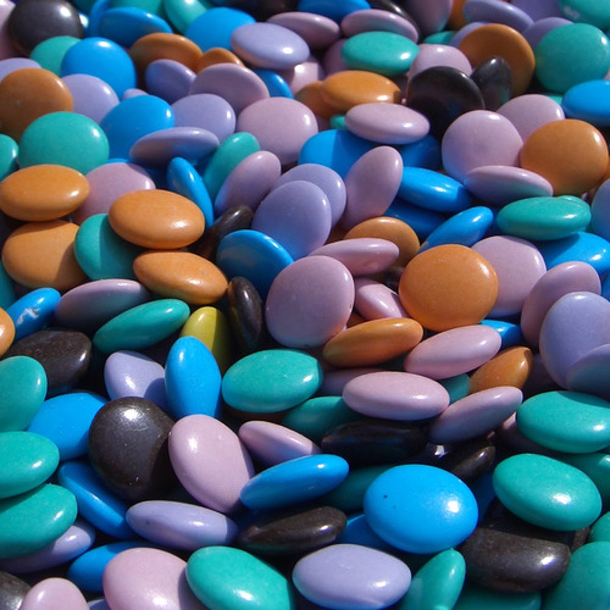 <p>(adj.) composed of different kinds, diverse</p>