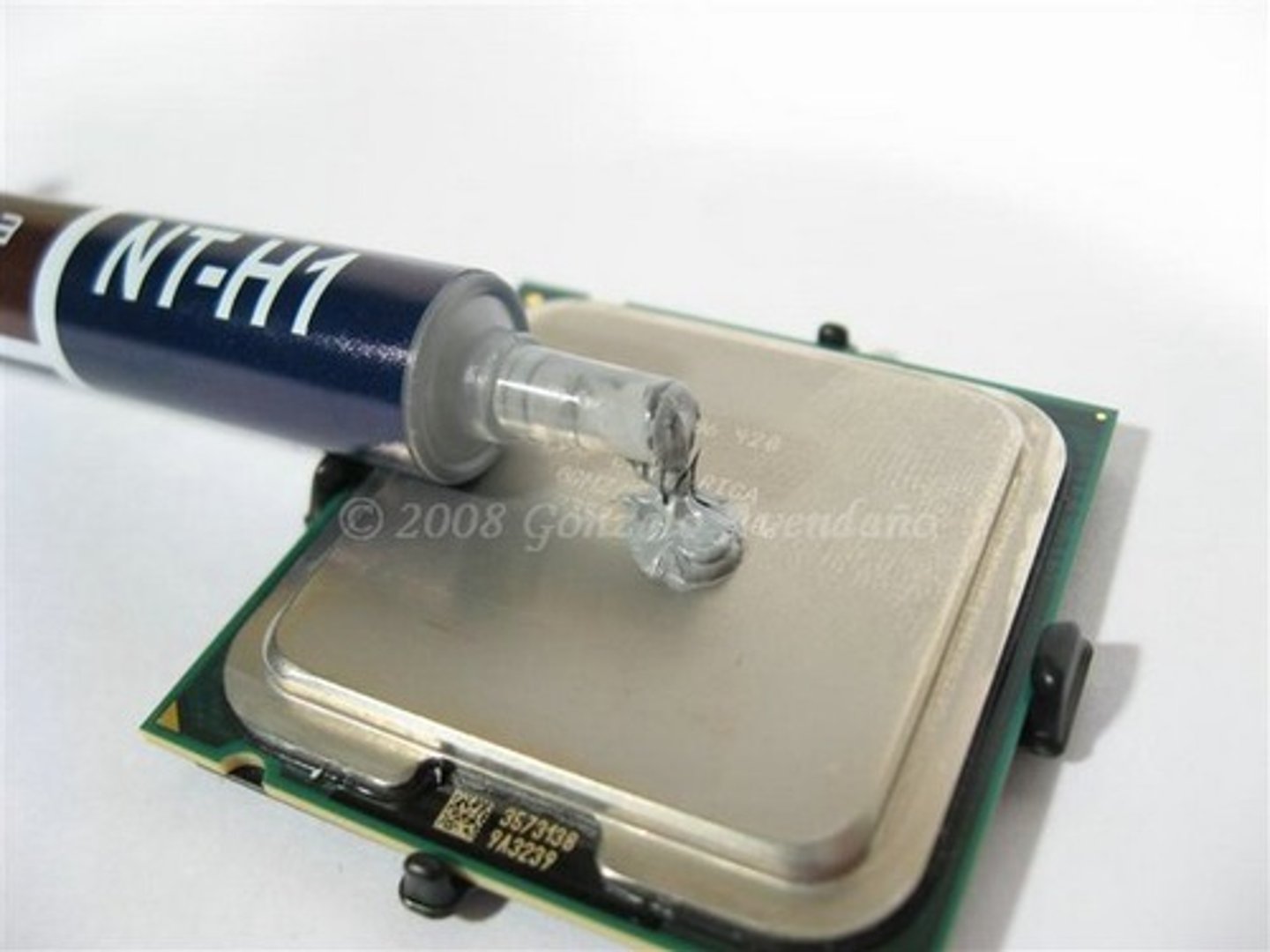 <p>A special compound used between CPUs and heat sinks. It fills in microscopic gaps and helps draw heat from the CPU into the heat sink where it is dissipated.</p>