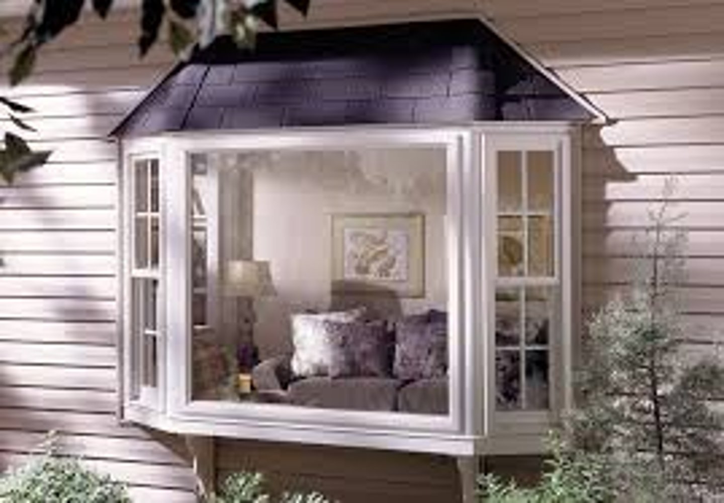 <p>A window projecting from the surface of the wall to allow light from three sides</p><p>Oriel window- bay window supported by brackets</p><p>Bow window- curved bay window</p>