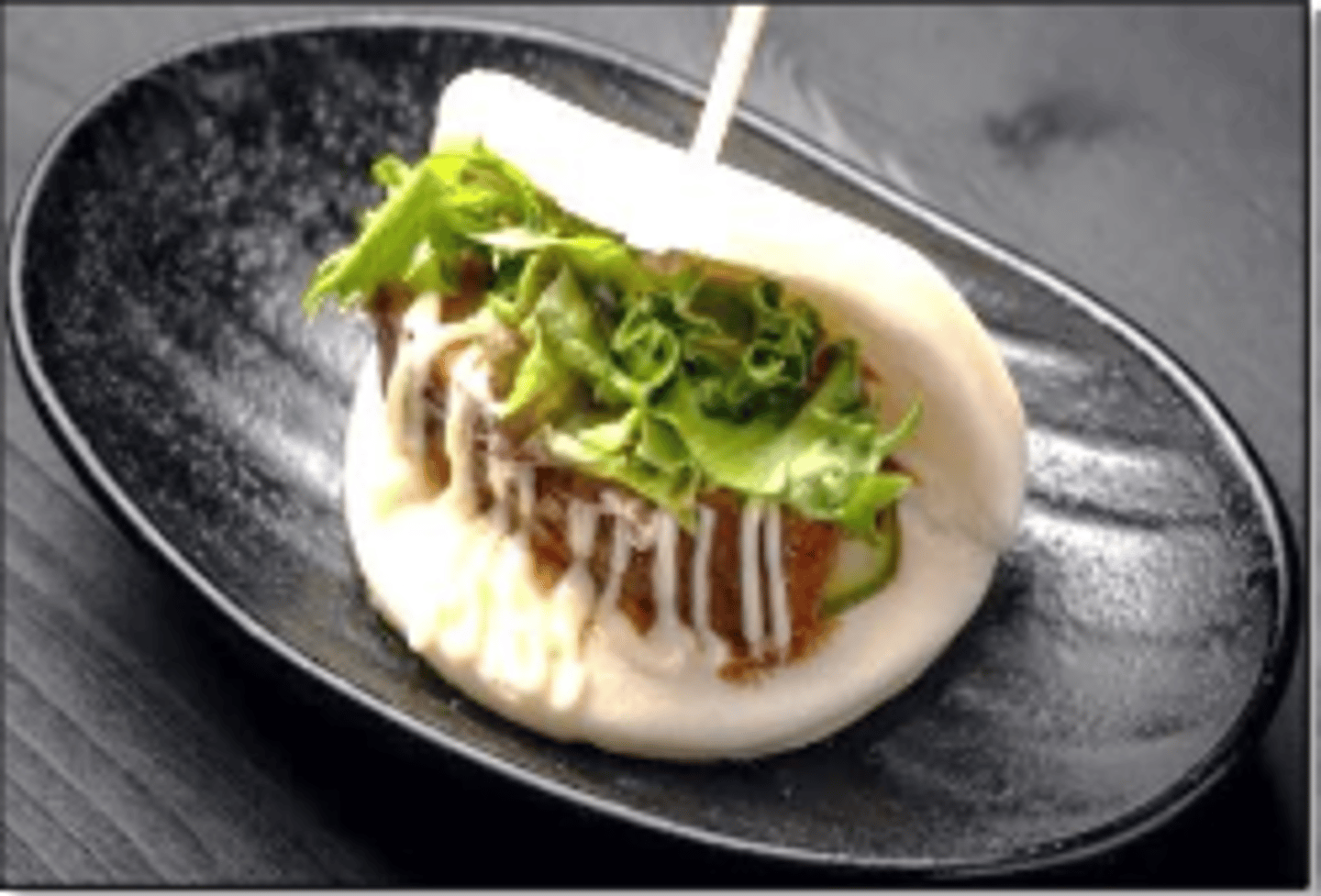 <p>Steamed bun, Pork chashu, Cucumber, Baby greens, Bun sauce, Mayo</p>