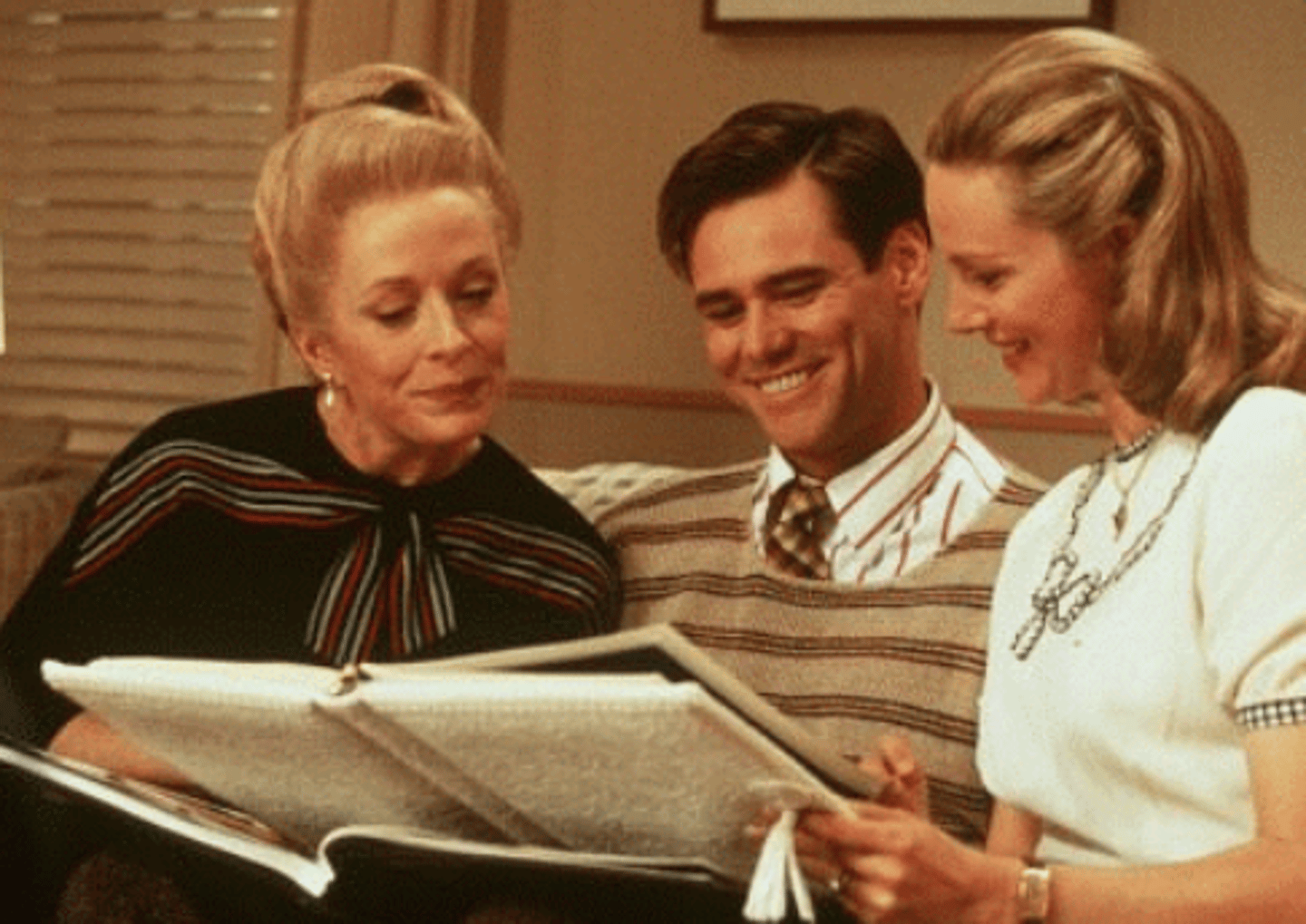<p>The fashion within The Truman Show is all retro - they belong in the 40s and 50s: dresses with big skirts and waists; women in hats - and men too. They help to suggest this 'ideal' world is a hankering for the past - and a mythical past at that. The other noticeable thing is the colour co-ordination of the clothes - and everything else in Seahaven. Freeze on any Seahaven scene and you will see the same few colours, all toning.</p>