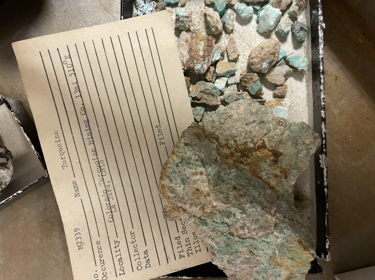 blue color, hardness 5-6, fine grained or massive habit, 