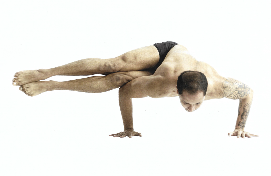 <p>Parsva Kakasana</p>