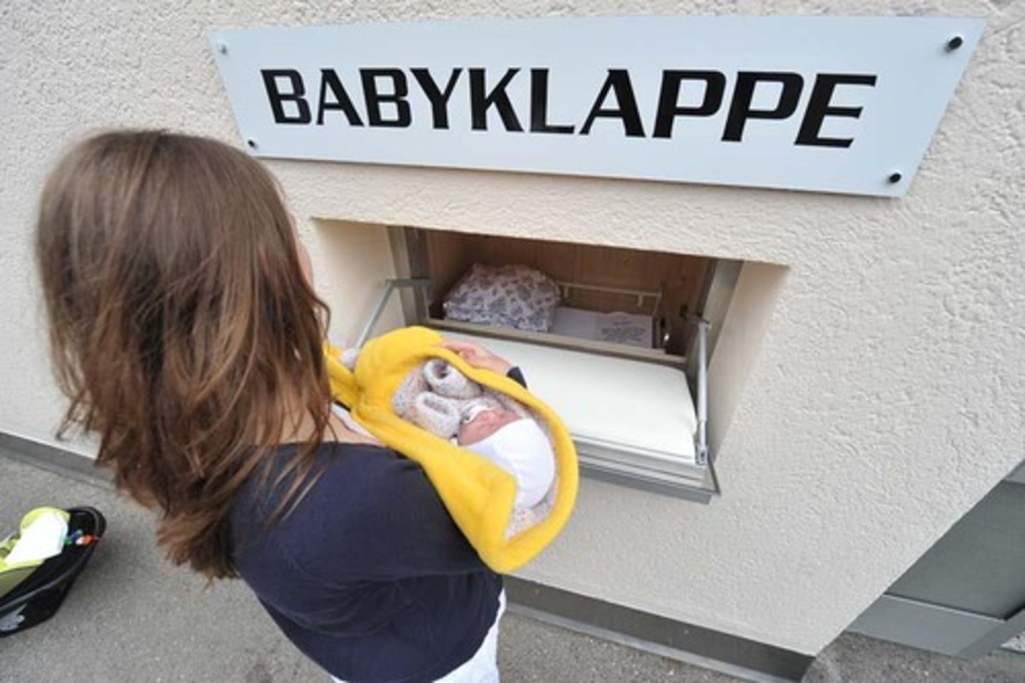 <p>to make it possible for other people to adopt one's baby</p>