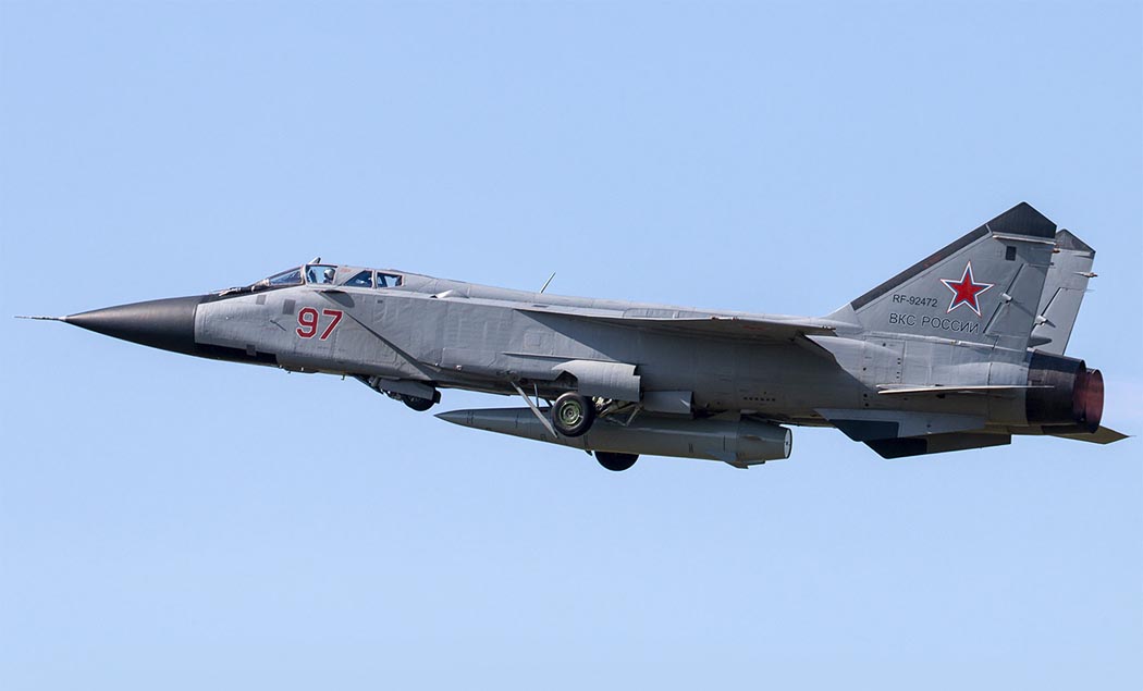 <p>FOXHOUND, MiG-31, МиГ-31 (Tandem seat, sloped intakes, exhaust obtrudes past vertical stablisers, Long pointed nose)</p>