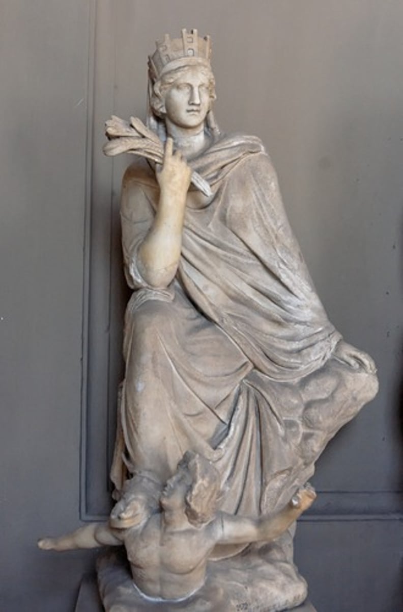 <p>Vatican Museum. Roman copy of a (much bigger) bronze original created by Eutychides, ca. 300-290 BCE. crown shaped like fortified walls, holds grain in hands (symbolic of abundance and fertility), and is seated on a rock said to be Mt. Silipius. Swimming figure at her feet is the Orontes River. very Lysippan style, limbs all turned in different directions. Statue was raised above Antioch as a symbol of the city.</p>