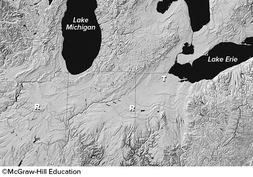 What is the origin of smooth troughs (T on this figure) cutting across the landscape in the Great Lakes area?