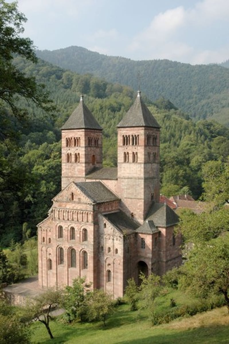 <p>1160 AD</p><p>in Murbach, France, mostly destroyed in French Revolution, only transept and choir remain, rounded arches for support, simple geometry (like the Romans)</p>