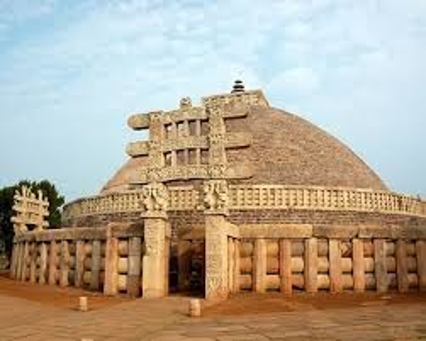 <p>300-100 BCE, stone masonry, sandstone dome. Sanchi, Madhya Pradesh, India<br>Built en masse by King Ashoka (First buddhist king, made buddhist stupas trendy)<br>Meant for PILGRIMS! Trapezoid stairway leads to upper walkway, CIRCUMAMBULATE the monument<br>DIDACTIC!!! Toranas (GATES) have crowded/lively scenes from buddha's life and other significant symbols<br>High + low relief.<br>BODHI TREE - Where he became ENLIGHTENED!<br>600 PPLS names: FINANCIAL CONTRIBUTORS, DONORS. Karmic benefit from contributing = a better next life<br>Stone OG painted white</p>
