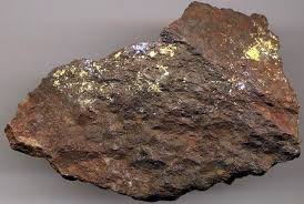<p>Metamorphic rock composed mostly of garnet; forms under high pressure and temperature.</p>