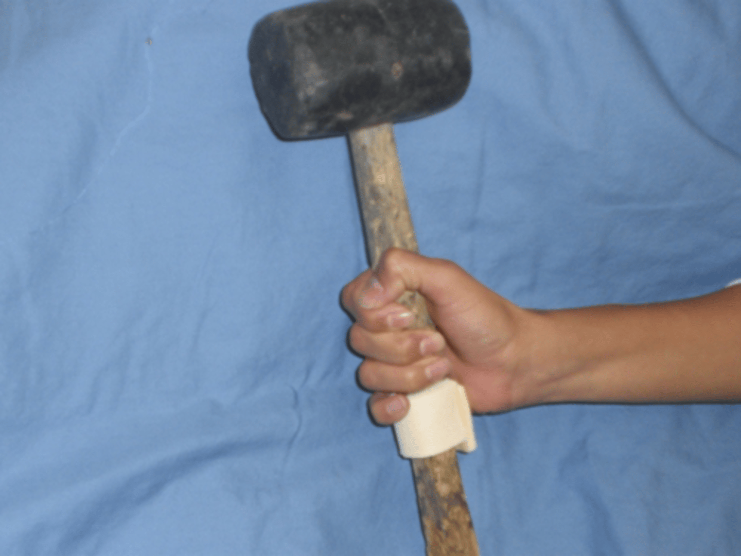 <p>Do an activity where flexor muscles are contracting and providing tension on adhesions</p><p>ex. hammer, clothespin, screwdriver</p>