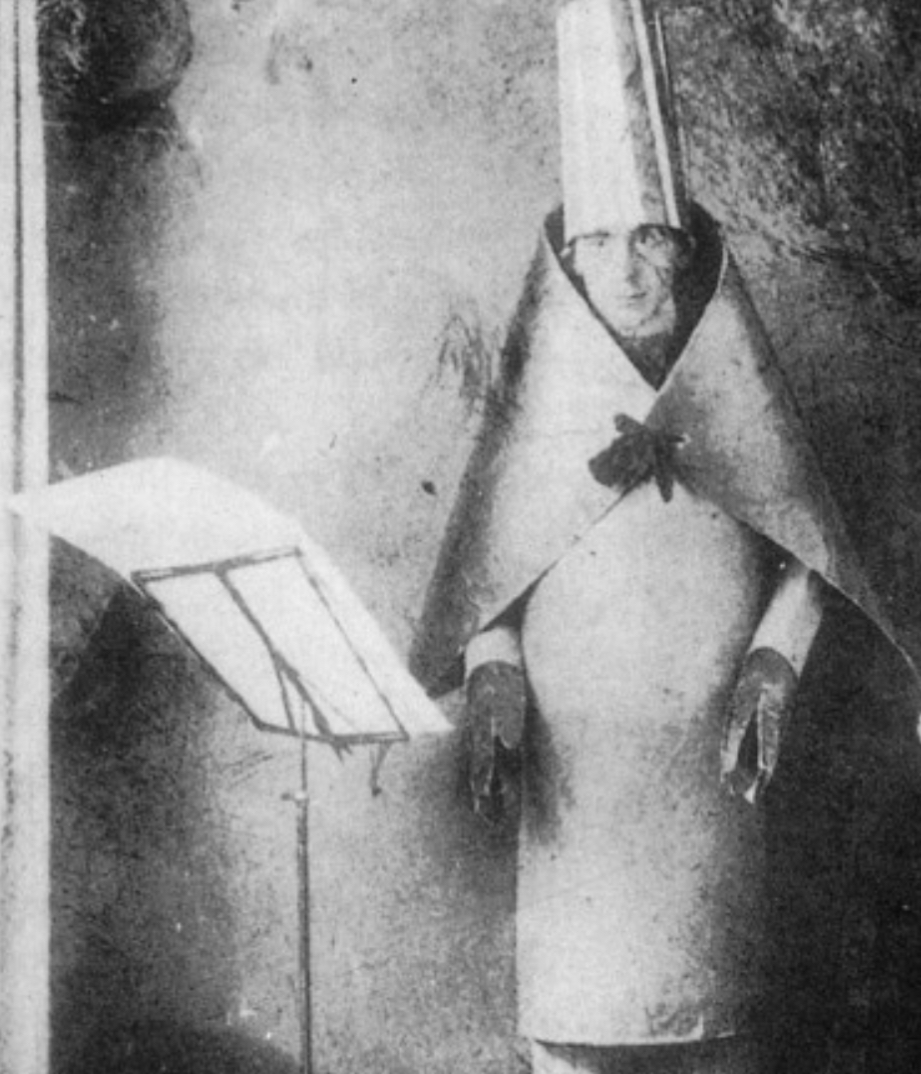 <p>What kind of art form is the artist’s work at Cafe Voltaire?</p><p>Why is it dada?</p><p>What did Dada advocate in the face of the horrors of WW1?</p>