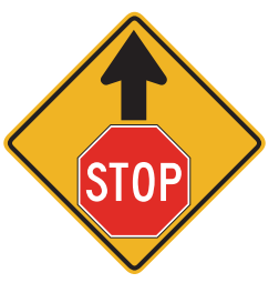 Slow down and be ready to stop at the stop sign.