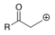 <p>R(O=)C-CH<sub>2</sub>-C<sup>+</sup></p>