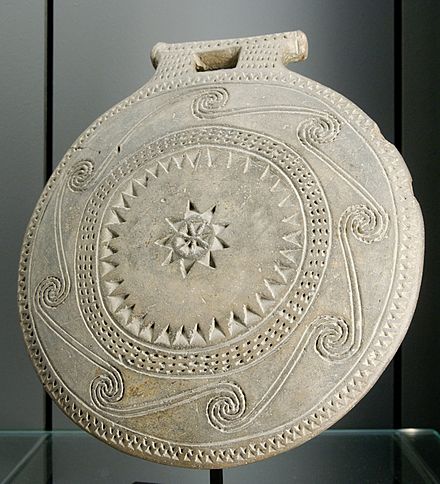 <p>clay, incised decoration, transitional between the ECI Grotta-Pelos and ECII Keros-Syros Culture, maybe center represents the sun</p>
