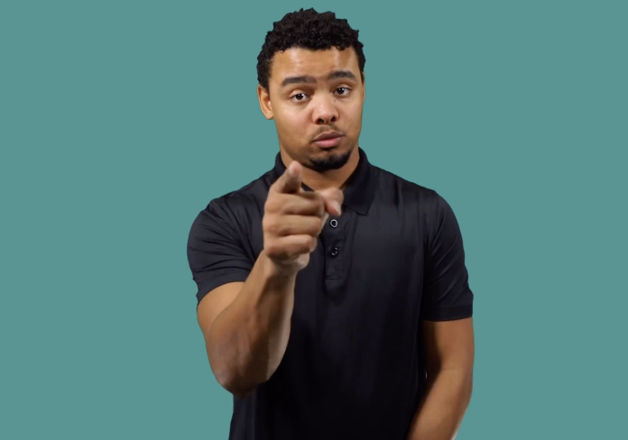 <p>Point with your index finger away from your chest; raise your eyebrows</p>