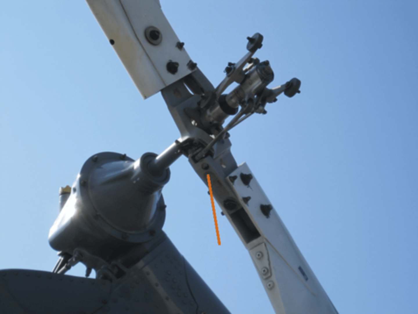 <p>extends perpendicular to the main rotor blades. connects directly to the blade grips and stabilizer bar and receives control inputs from the pilot and translate it into force moving the blade grips</p>