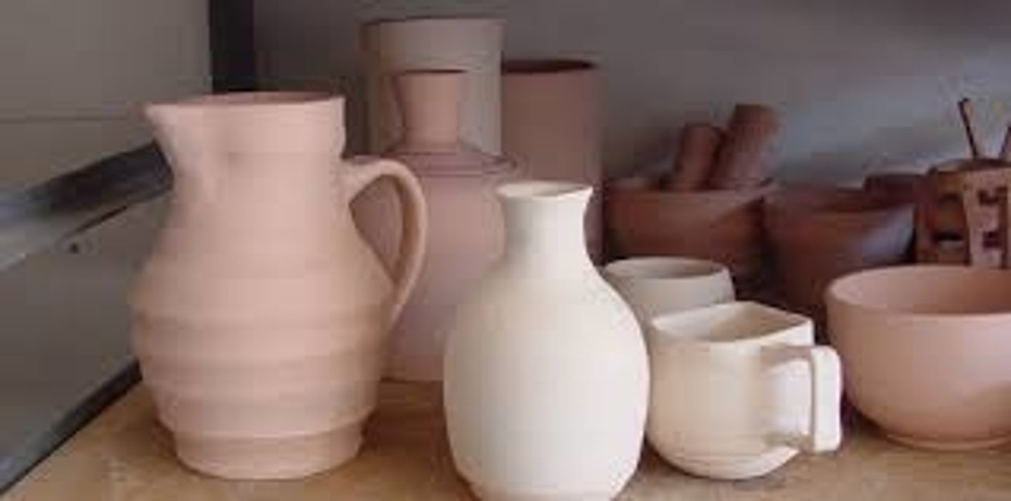 <p>when a piece has been fired once in a kiln. Bisqueware can be glazed and fired again. At this stage, prior to being glazed, the clay is still porus. Prior to being fired, all unfired clay pieces are referred to as greenware.</p>