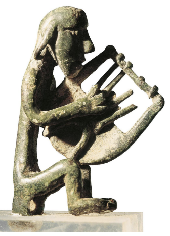 <p>Syrian-Cretan bronze lyre-player</p>