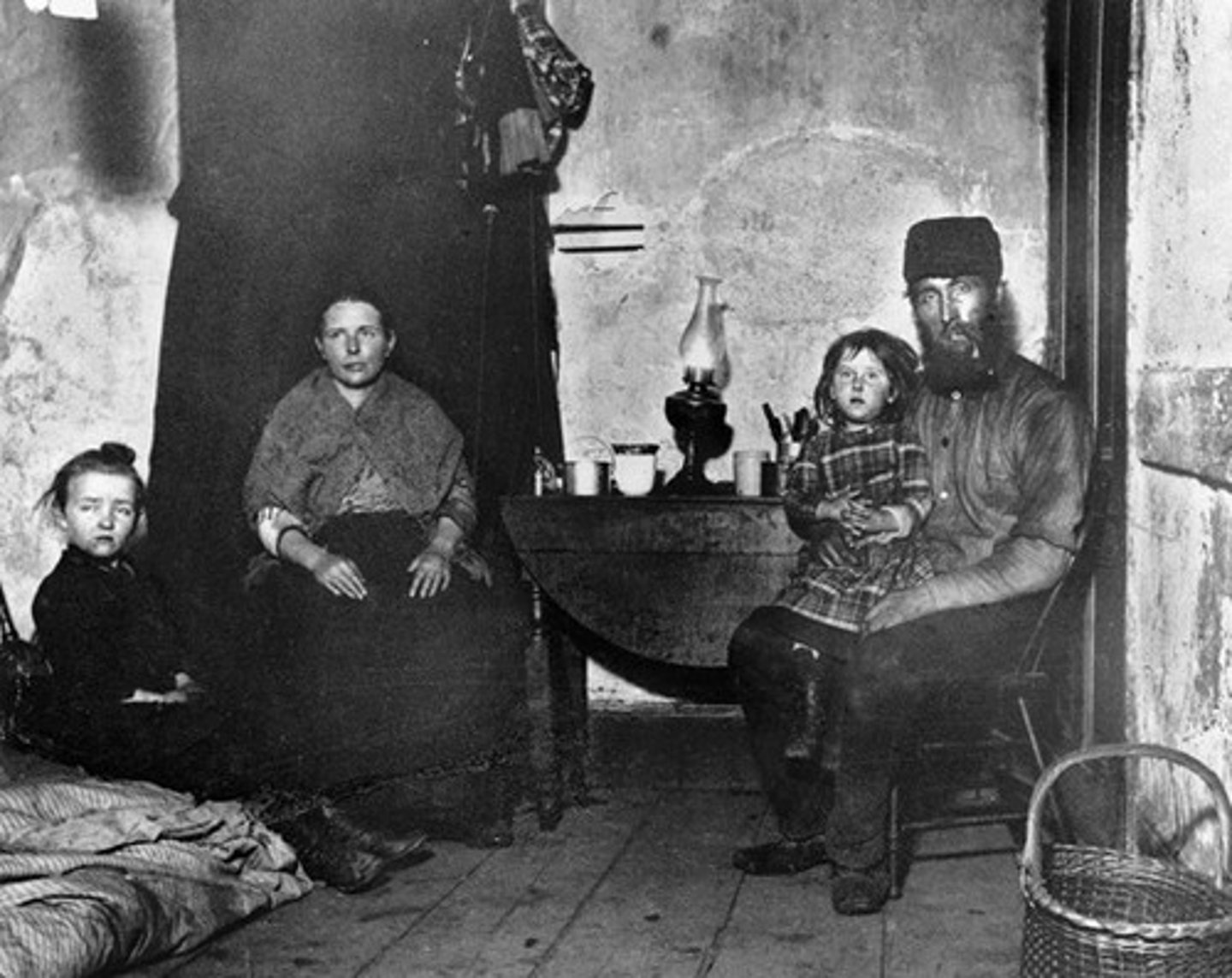 <p>Cheap housing for the poor. Mainly immigrants. Manhattan's 42,700 housed 1.6 million people.</p>