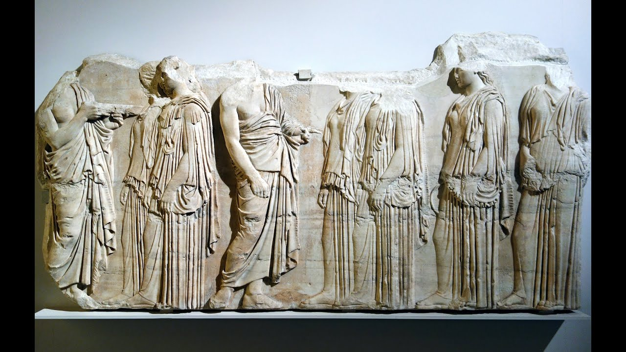 The Ergastines women who are bringing the peplos to the Parthenon is being interrupted by priests. Moving from right to left.