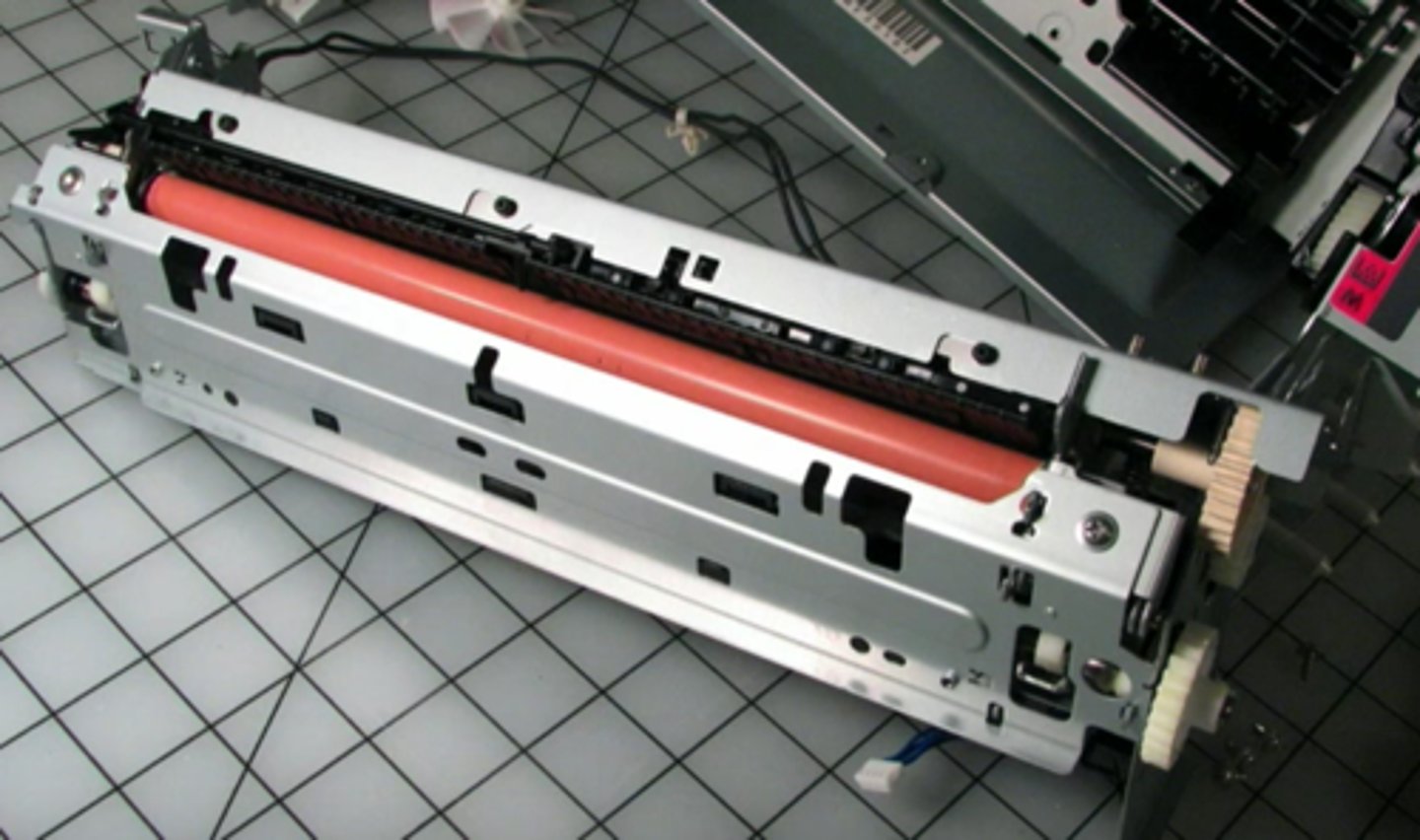 <p>A component in laser printing that uses heat and pressure to fuse the toner to paper. Usually, two rollers, one heated and one for pressure, that the paper runs between</p>