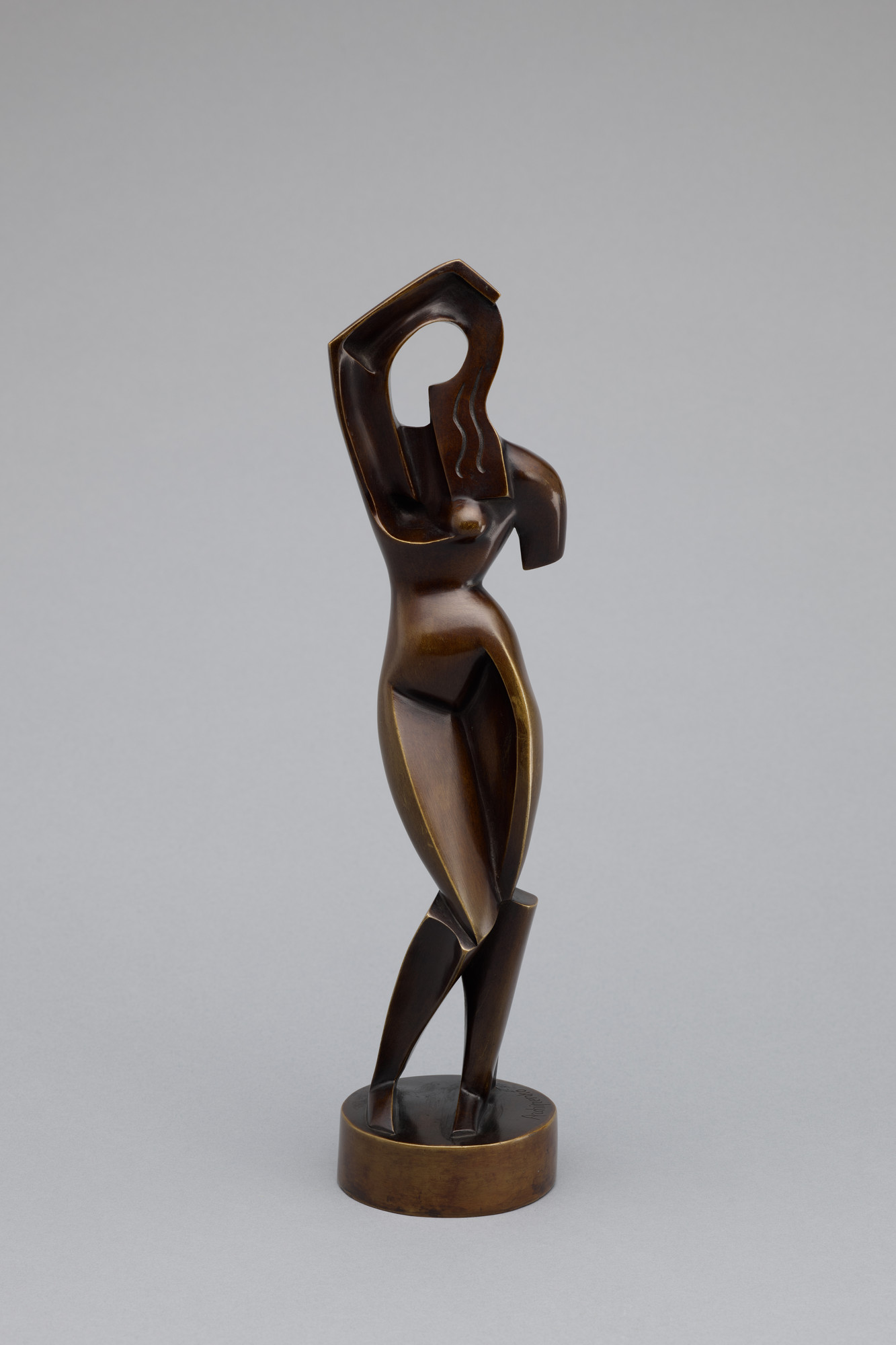<p>Woman Combing her Hair</p>