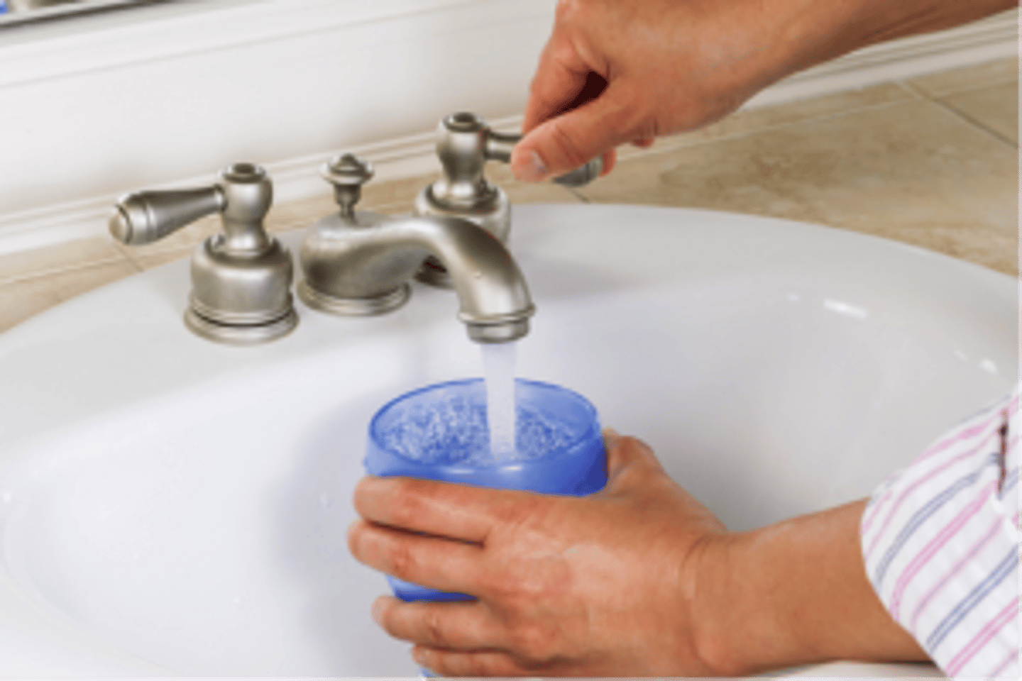 <p>to fill a cup with water</p>